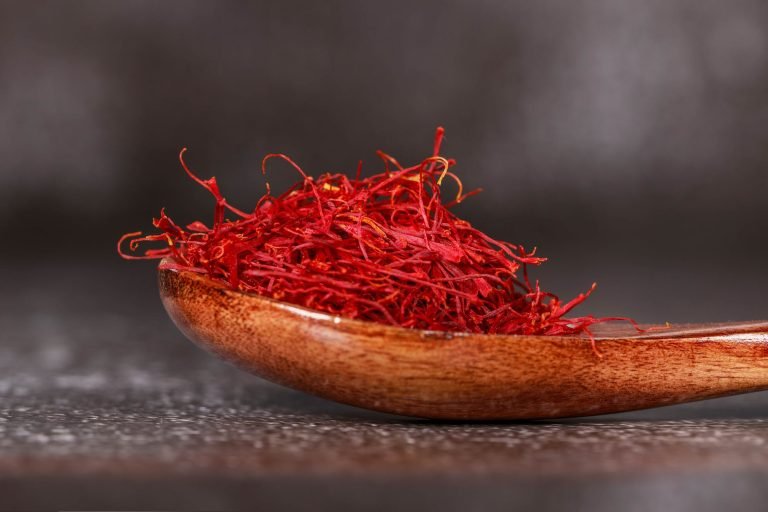 Saffron threads infusing in warm water