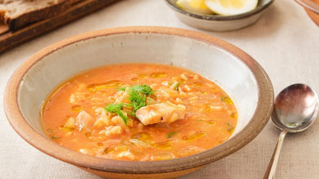 Serving suggestion for fish soup with saffron.